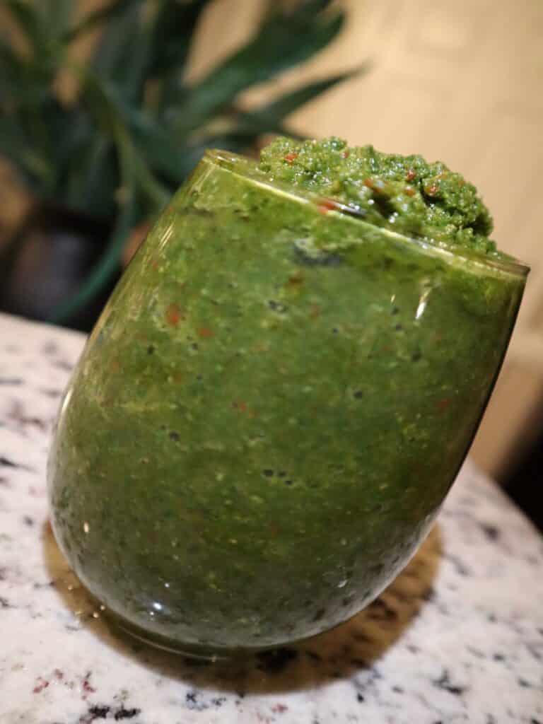 trinidad green seasoning fresh herb seasoning in a glass jar